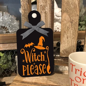 Halloween wooden sign with Witch Please text and bow on rustic farm background