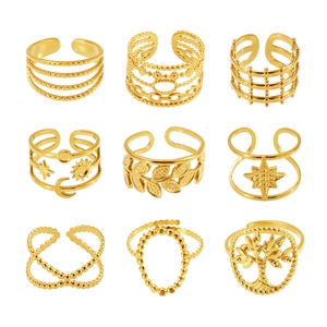 Set of 9 gold-plated stainless steel open rings featuring tree of life and star moon motifs