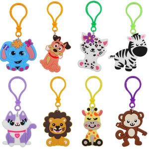 Set of 8 cute cartoon jungle animal silicone keychains with matching hooks on white background