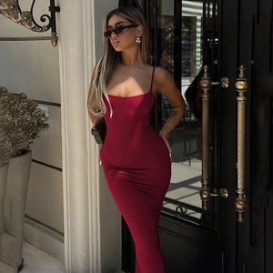 Close-up of the red slim fit backless sling dress showing stretch fabric and bodycon cut