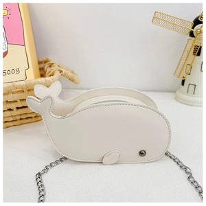 Close-up of white dolphin-shaped PU leather crossbody bag with silver metal chain strap