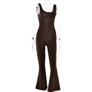 Detail of high-waist brown flare leg jumpsuit featuring a backless U-neck design