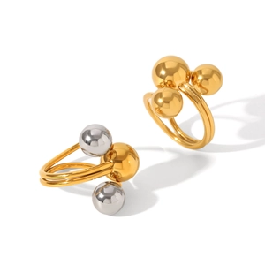 Exaggerated stainless steel dual-band rings with polished gold and silver spheres