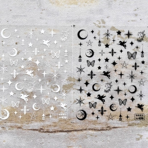 Autocollants nail art ciel étoilé avec motifs lune et licorne en noir et blanc