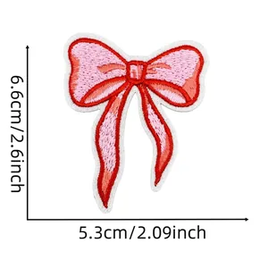 Detailed dimensions of blue bow tie embroidery patch with precise measurement labels
