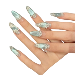 Handcrafted blue ice-translucent cat-eye press-on nails with rhinestones and pearls