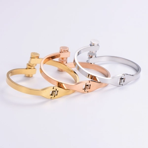 Polished 304 stainless steel bangles in gold, rose gold and silver with industrial spring design