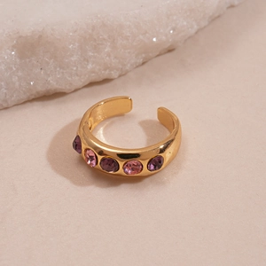 Detail of gold-plated adjustable ring with five purple and pink gradient gemstones
