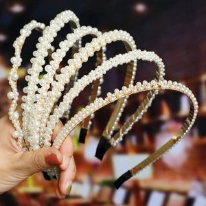 Handmade bridal pearl headband with rhinestones in various elegant knotted designs