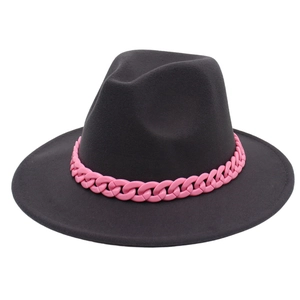 Detailed close-up of charcoal grey wool fedora hat with vibrant pink chunky chain accent