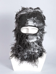 Close-up of distressed knit balaclava mask with raw-edge fringe detail in grey melange