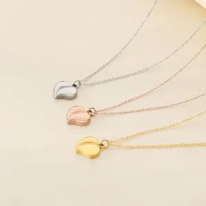 Minimalist heart pendant necklaces in gold, rose gold, and silver on O-chains