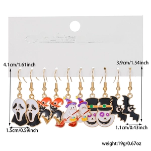 Detailed set of five Halloween earrings including ghost, pumpkin, bat and cat charms