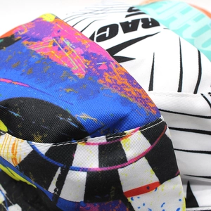 Graffiti bucket hat with RACING print featuring vibrant street art style and sun protection