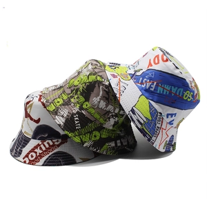 Detail of colorful graffiti print bucket hats featuring street style art and text