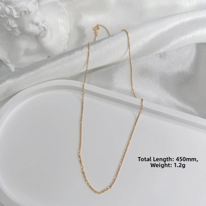 Close-up of a 450mm gold-plated S925 sterling silver thin cross chain weighing 1.2 grams