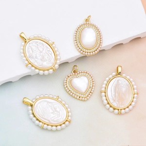 Religious mother of pearl 18K gold plated pendants with pearls in oval and heart shapes