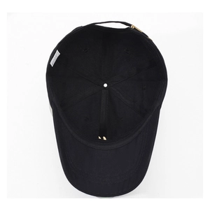Internal view of a black 100% cotton baseball cap showing 6-panel structure and sweatband