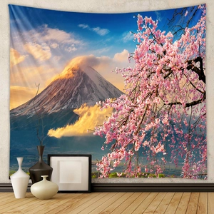 Detail of bohemian tapestry featuring Mount Fuji landscape with cherry blossoms and clouds
