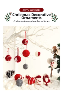 Close-up of wool felt Christmas ornaments with star and snowflake patterns on tree