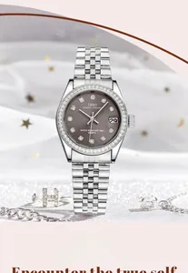 Detail view of quartz watch with sparkling rhinestones and silver metal strap on silk
