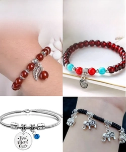 Detailed view of assorted handmade bracelets featuring silver charms and gemstone beads