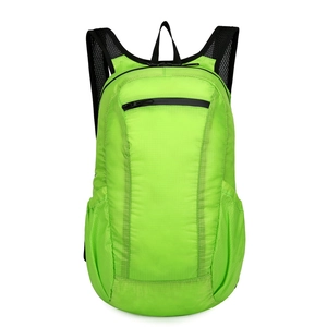 Waterproof lightweight folding sports backpack in neon green ripstop nylon fabric