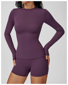 Slim fit deep purple brushed yoga set featuring long sleeve top and athletic shorts