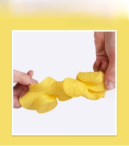 Close-up showing the high elasticity and flexibility of the lemon-shaped silicone mold