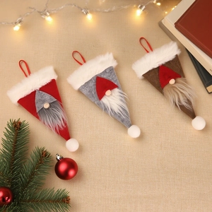 Three Christmas gnome hanging ornaments in red, grey, and brown felt for festive decor