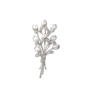 Detail of silver wheat-style brooch with freshwater pearls and sparkling zircons