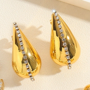 Detail of 18K gold-plated teardrop earrings with a row of sparkling white zircon stones
