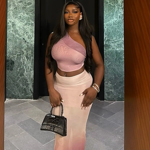 Gradient pink off-shoulder crop top and bodycon maxi skirt set with textured handbag
