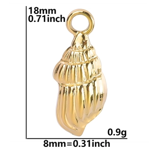 Detailed view of golden conch pendant with textured finish and measurement markings