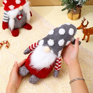 Nordic Christmas gnome plush doll held by hand for festive holiday home decoration