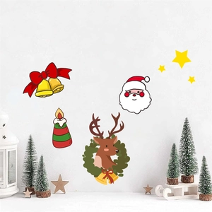 Detail showing Christmas wall decals with Santa Claus, reindeer, and golden bells on a wall