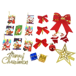 Christmas tree decoration set with red bows bells gold star and Merry Christmas sign