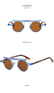 Macro detail of round steampunk sunglasses with blue frames and tea lenses