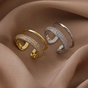 Double layered gold and silver rings with cubic zirconia pave and open adjustable band