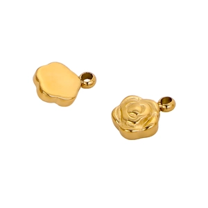 Detailed view of 3D rose flower pendants in golden stainless steel for DIY jewelry