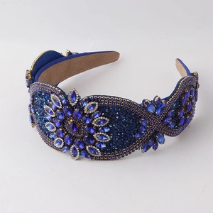 Macro detail of Baroque style wide headband with deep blue rhinestones and non-slip lining