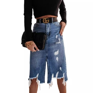 Slim fit denim midi skirt in classic blue with ripped details and frayed fringe hem
