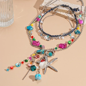 Bohemian multilayer necklace set featuring silver starfish shell pendants and colorful beads