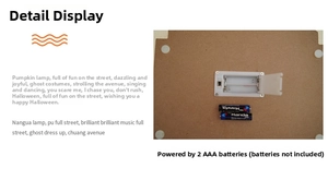 Detail view of the battery compartment for Halloween LED door signs requiring 2 AAA batteries