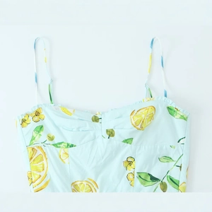Summer light blue poplin dress with yellow lemon print and delicate spaghetti straps