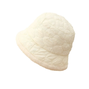 Quilted minimalist bucket hat with plush faux fur trim in creamy white for winter wear