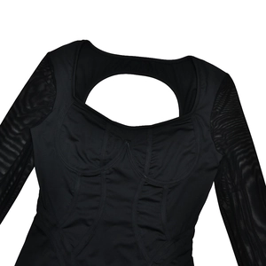 Close-up of black square-neck bodysuit with chest cutout and sheer mesh long sleeves