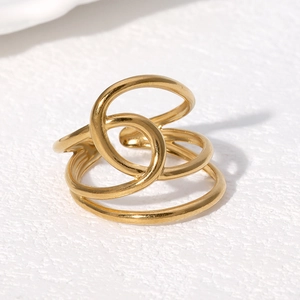 Minimalist 18K gold multilayer spiral wrap stainless steel ring on white background