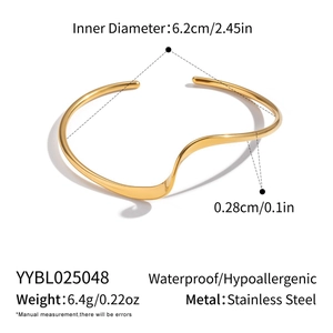 Detailed view of gold stainless steel wavy cuff bracelet with technical measurements