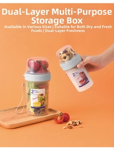 Macro detail of portable double-layer food container with dry-wet separation and carrying strap